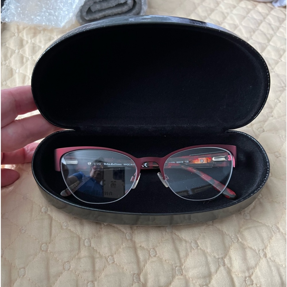 John Galliano readers